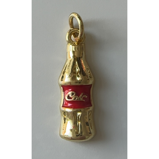 Gold-colored Cola bottle charm on a light gray background