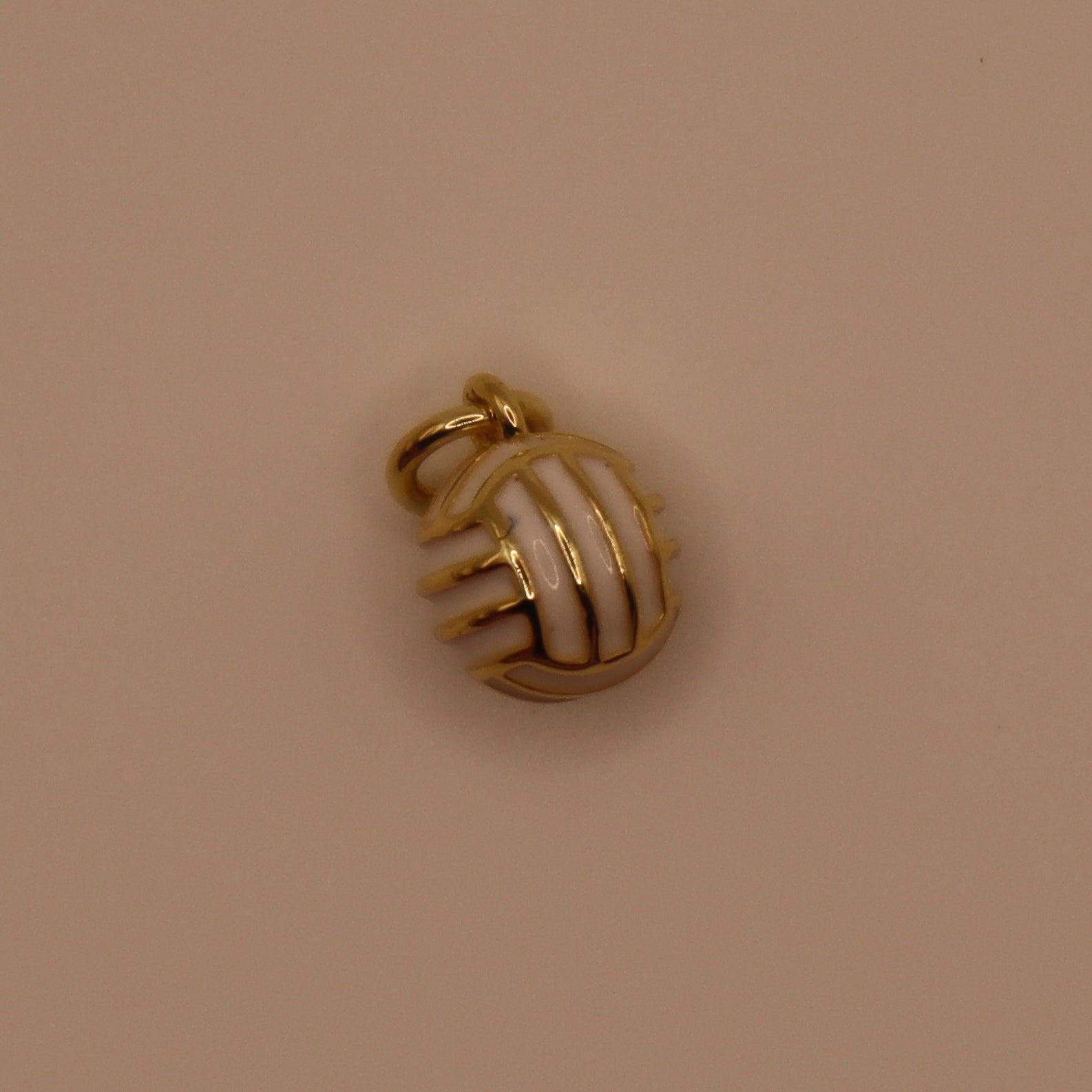 gold and white volleyball charm